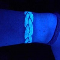 Glowing armband wrist tattoo