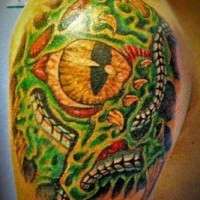 Extraterrestrial lizard creature realistic tattoo