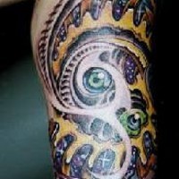 Sci fi abstract coloured tattoo on hand