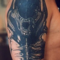 Alien xenomorph on shoulder tattoo