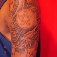 Asian dragon and pentagram tattoo