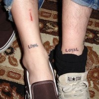 Amateur his and her leg tattoo