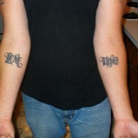 Ambigram tattoo on both hands