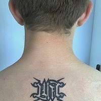 Ambigram tattoo on back
