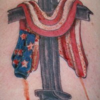 American flag on cross tattoo