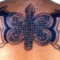 Tatuaggio disegno strano sulla schiena