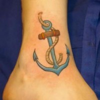Old anchor with rope tattoo on ankle