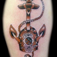 Old diving helmet and anchor tattoo in colour