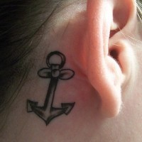 Little female anchor tattoo behind ear