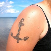 Classic anchor tattoo on shoulder photo