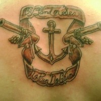 Guns and anchor tattoo with writings