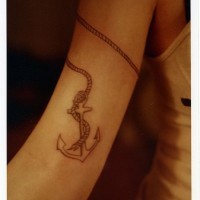 Anchor with rope around hand tattoo