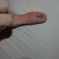 Little anchor tattoo on inner thumb
