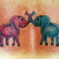 Blue and pink elephants tattoo