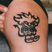 Tribal demon tattoo