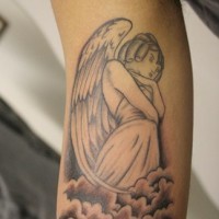 Angel in clouds tattoo on hand