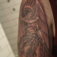 Wrathful archangel in sky tattoo