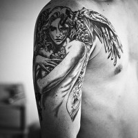 Qualitative tattoo of female angel with black wings