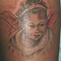 Little angel girl tattoo in colour