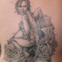 Angelic woman in roses large tattoo