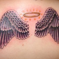 Angel wings and nimbus tattoo