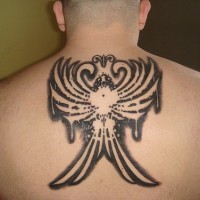 Rising phoenix tattoo on back