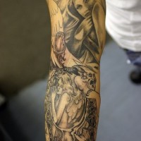 Full sleeve tattoo with angel and demons