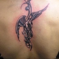 Angel theme tracery tattoo on back