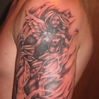 Naked angels tattoo on shoulder