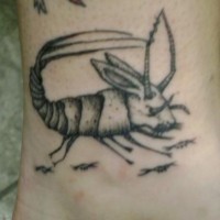 Scorpion-rabbit ankle tattoo