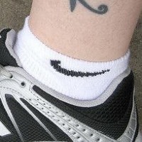 Gothic sign ankle tattoo