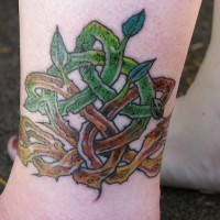 Confusion ankle tattoo