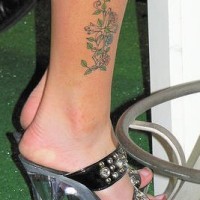 Designed cross ankle foot tattoo