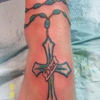 Daddy's cross ankle tattoo