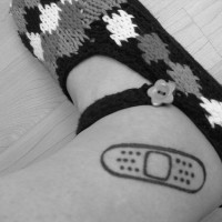 Slipper ankle tattoo