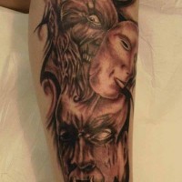 Monster in mask arm tattoo