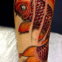 Red fish arm tattoo