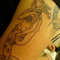 Mermaid arm tattoo