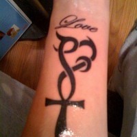 Cross and heart arm tattoo