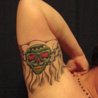Dia de muertos skull tattoo on arm