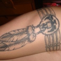 Incomplete indian arm band with feather