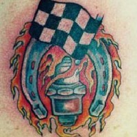 Racing flag with flaming horseshoe tattoo