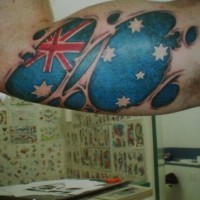 Australian flag skin rip tattoo