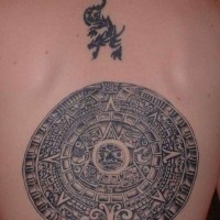 Aztec calendar stone tattoo on back