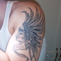 Aztec warrior with feathers tattoo on shoulder