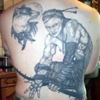 Ninja warrior with dog tattoo on back