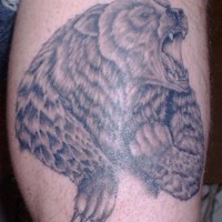 Roaring bear realistic tattoo