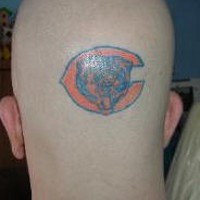 squadra logo orso tatuaggio sulla testa