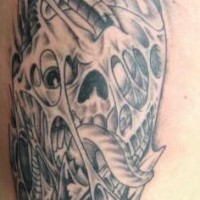 Biomech skull in agony black tattoo