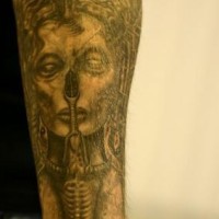 Giger style biomechanical tattoo